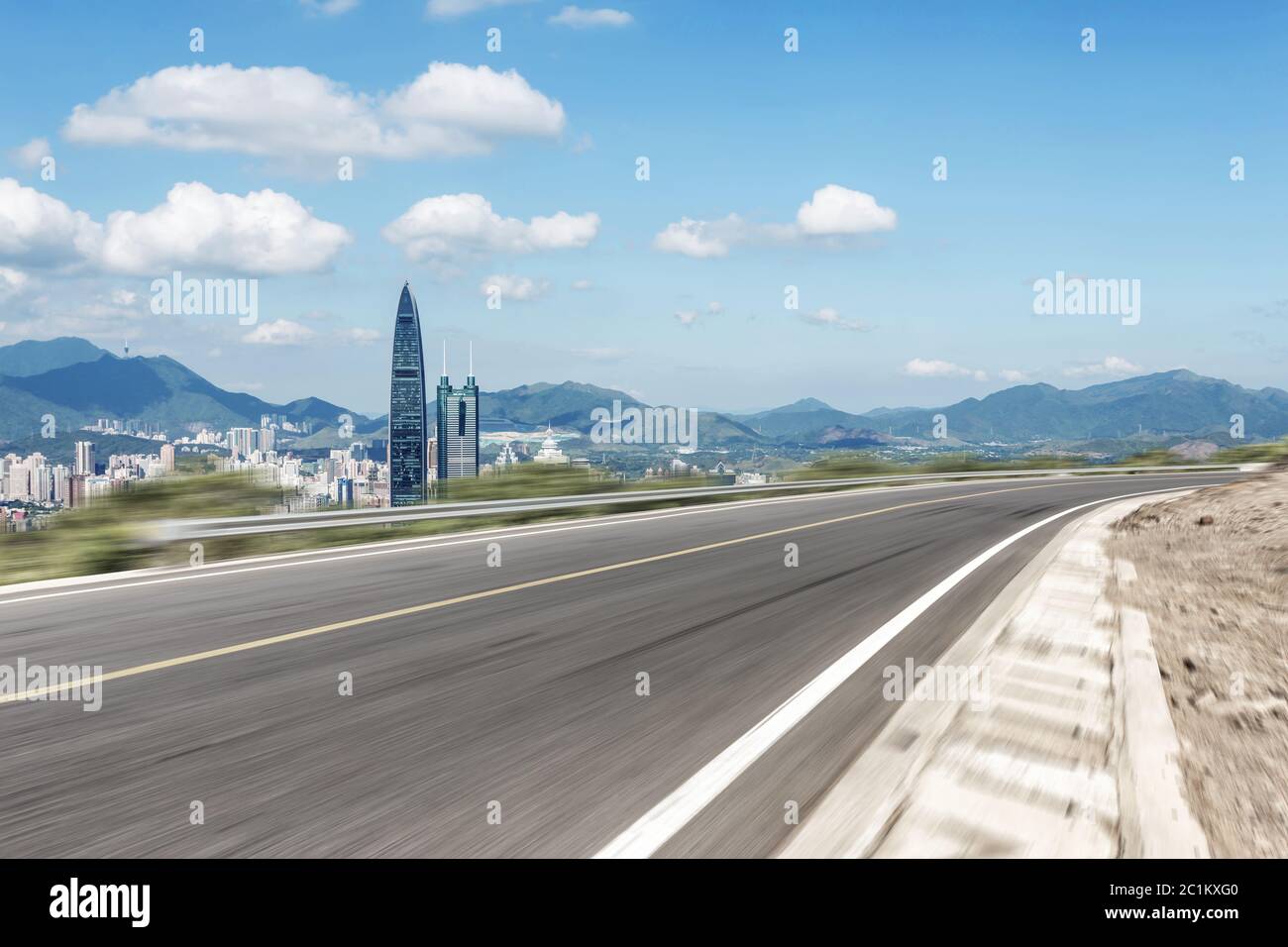 empty asphalt highway through modern city Stock Photo - Alamy