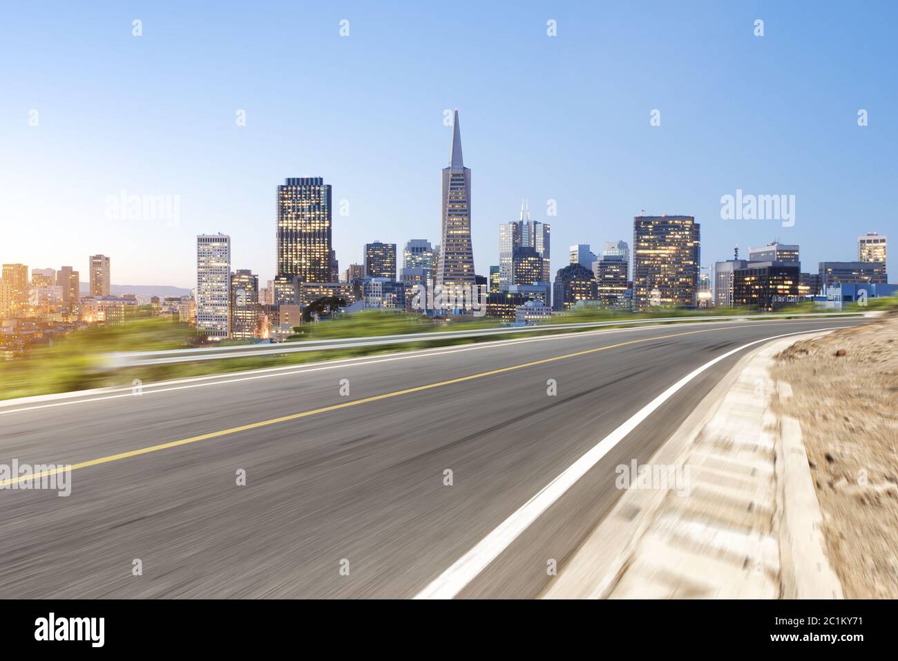 empty asphalt highway through modern city Stock Photo - Alamy