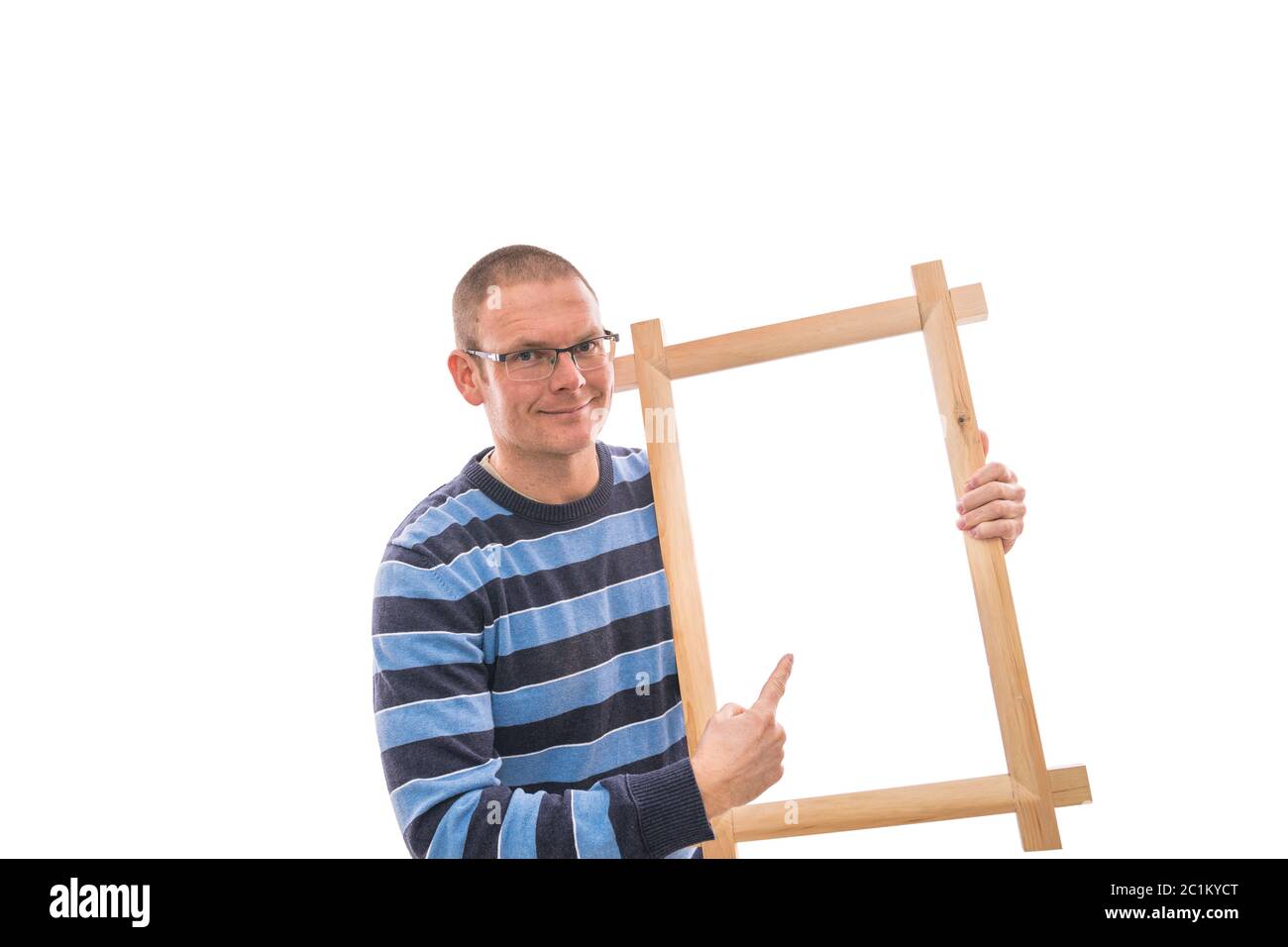 Man holds frame Stock Photo