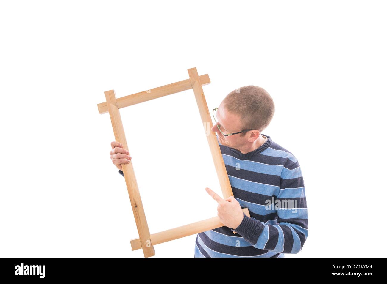 Man holds frame Stock Photo