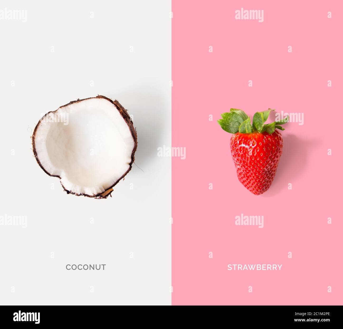 Creative layout made of coconuts and strawberry. Flat lay. Food concept. Stock Photo