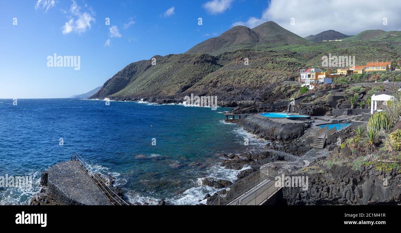 Coast with swimming areas and public seawater swimming pool in La Caleta, El Hierro, Canary Islands Stock Photo