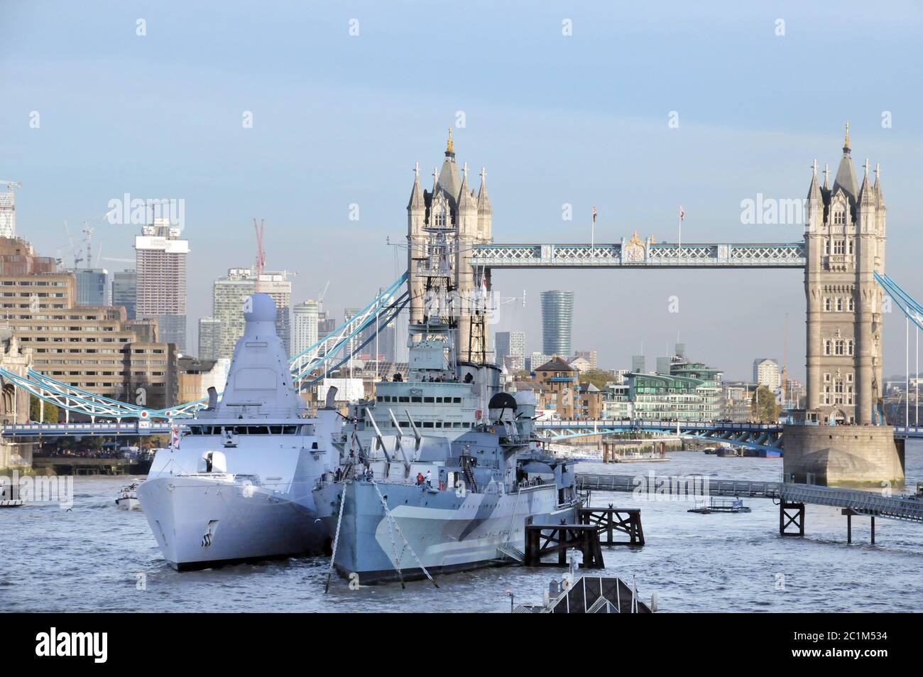 Tower Bridge with Warship Stock Photo