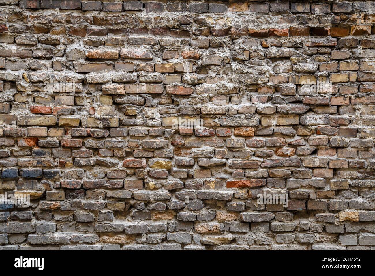 Background of old vintage dirty brick wall with peeling plaster ...