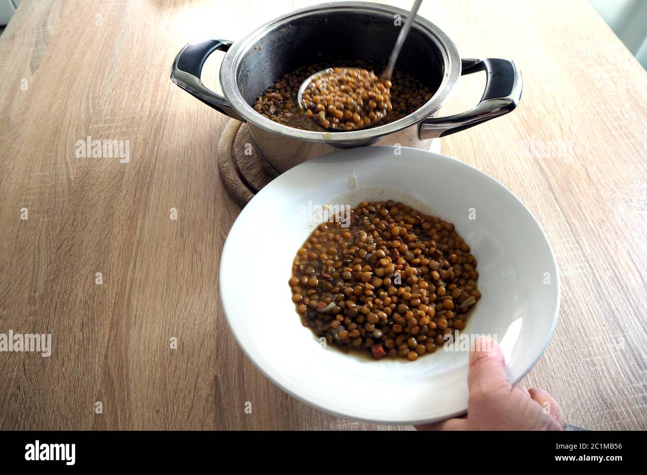 a pot with lentils for dinner Stock Photo Alamy