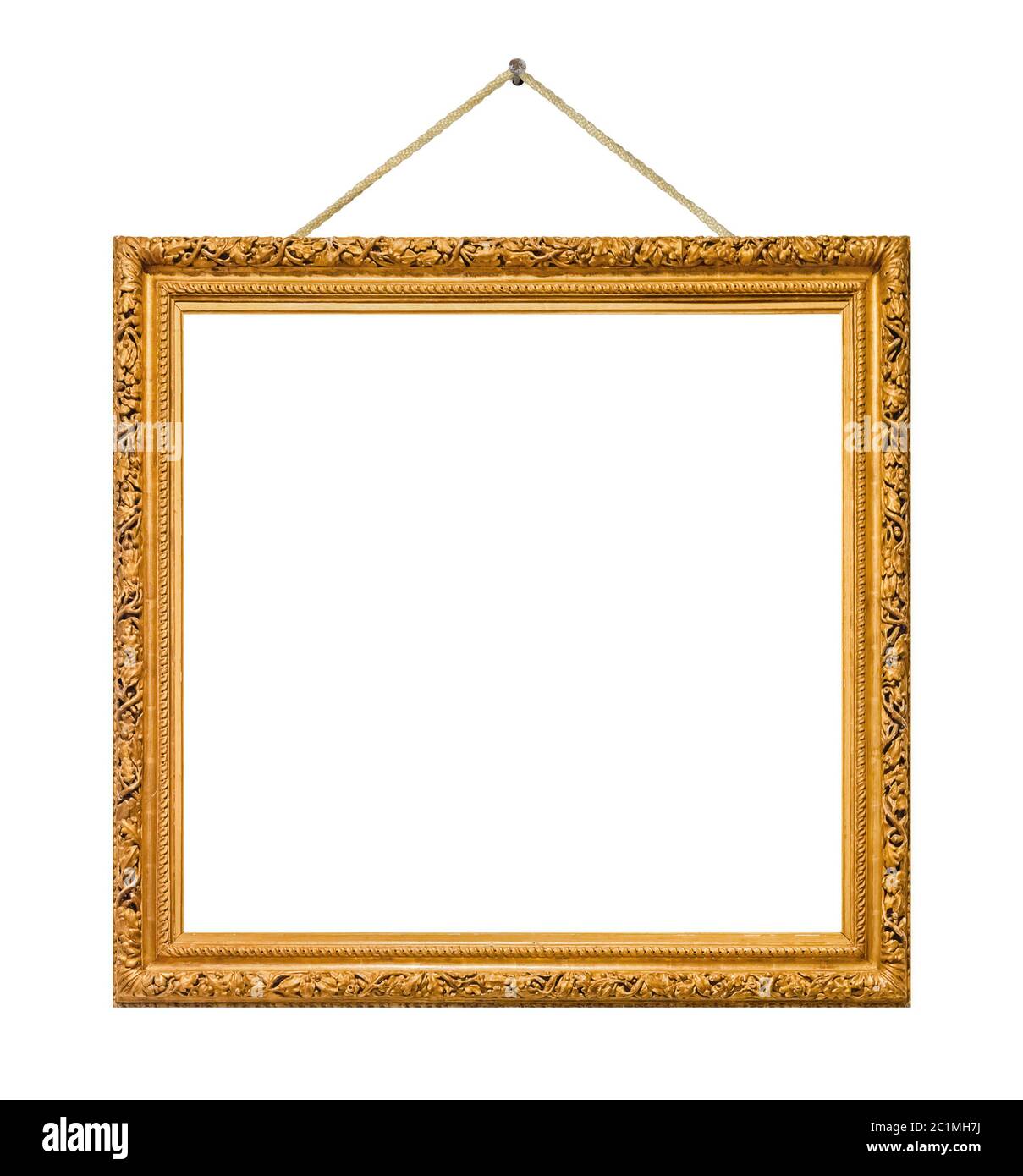 Old wooden picture frame hanging on a rope Stock Photo