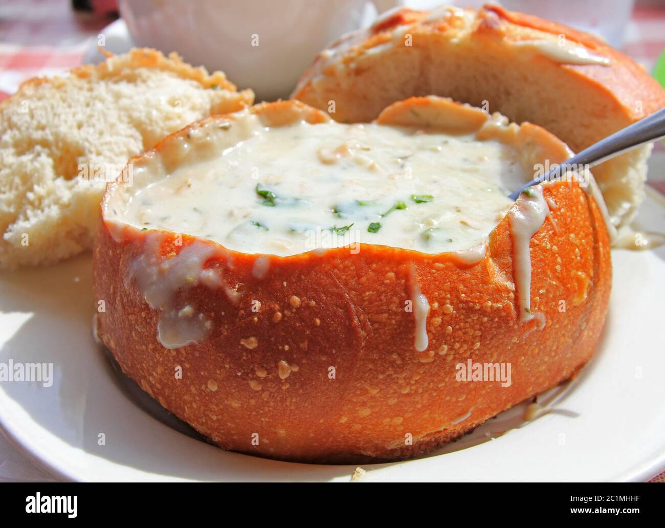 The most famous and popular in San Francisco mussel soup in a pot of