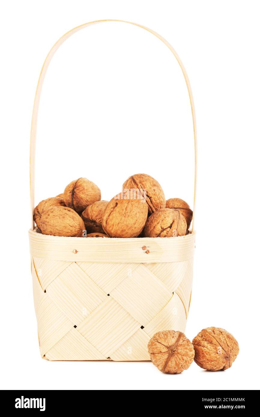 Walnut In Wooden Basket Stock Photo