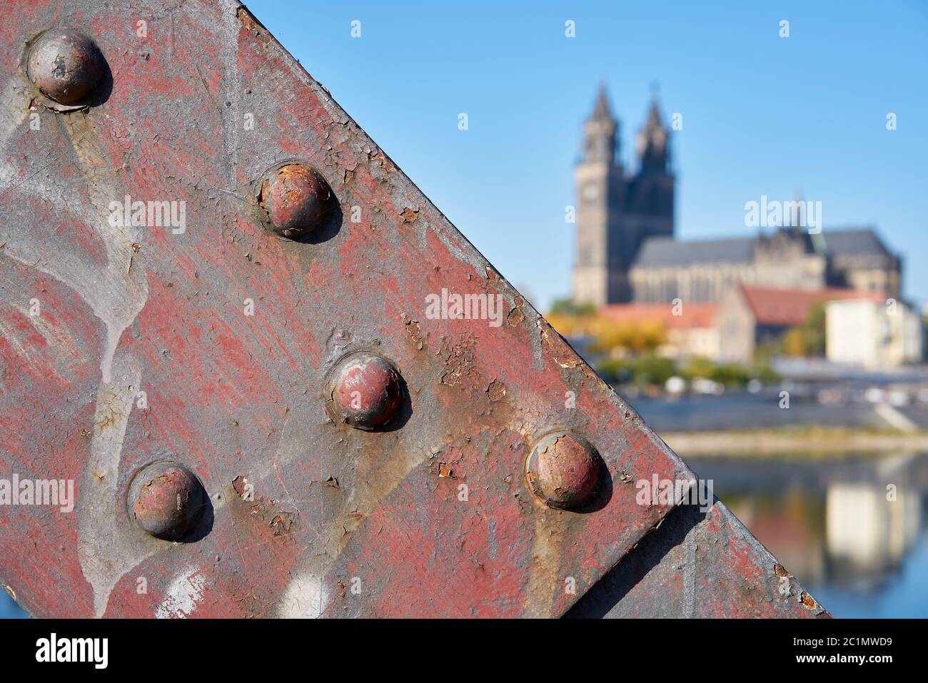 Detail of the lift bridge in Magdeburg. In the background the Magdeburg Cathedral, the landmark of the city. Stock Photo