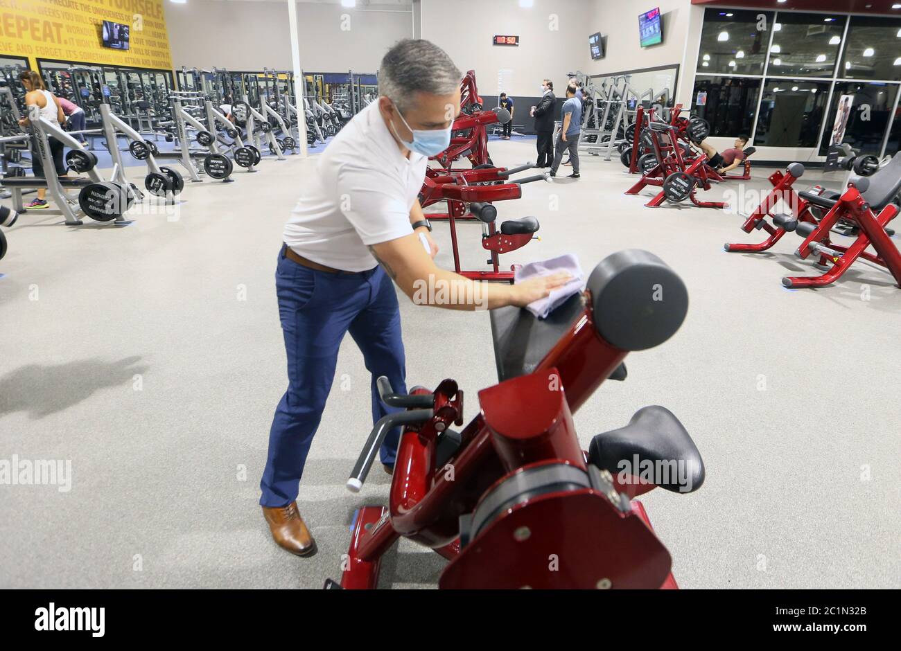 Maplewood United States 15th June Club Fitness Gym Employee Matt Bohn Wipes Down A Piece Of Equiptment On Day One Of Their Reopening In Maplewood Missouri On Monday June 15