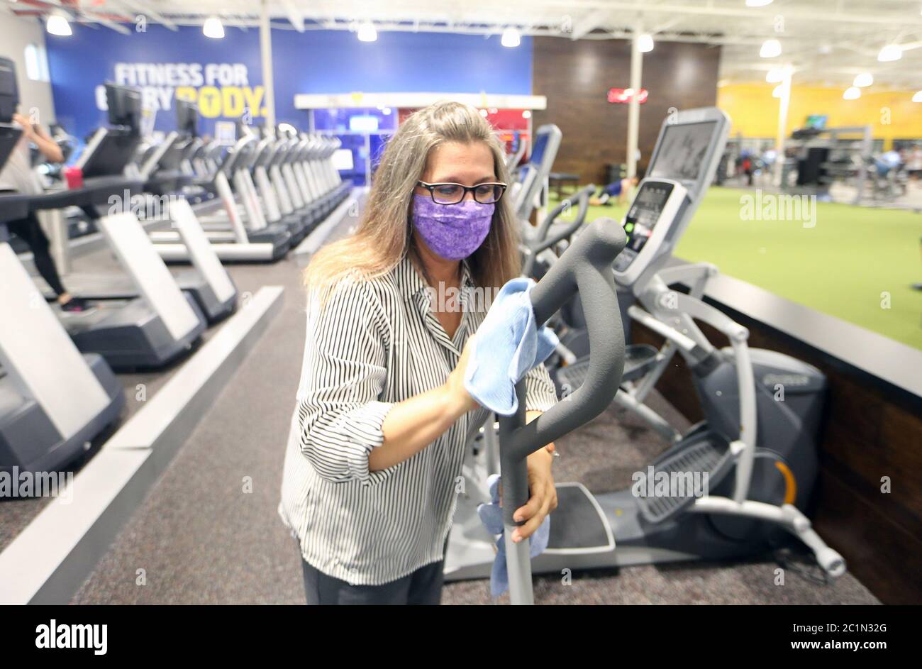 Maplewood United States 15th June Club Fitness Gym Employee Rachel Jameson Wipes Down Equipment After Use On Day One Of Their Reopening In Maplewood Missouri On Monday June 15 All