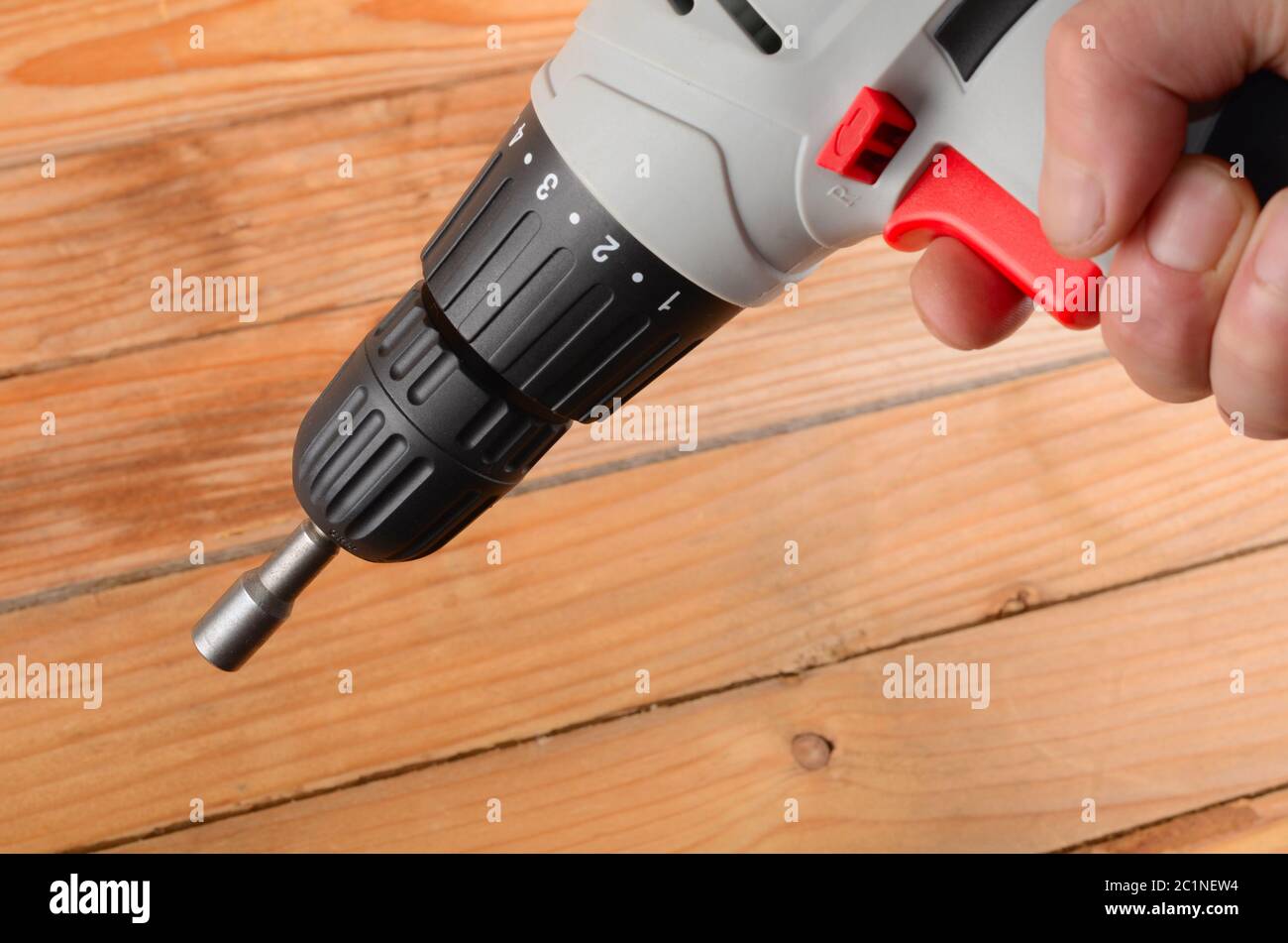 Screwdriver in a man's hand close up Stock Photo