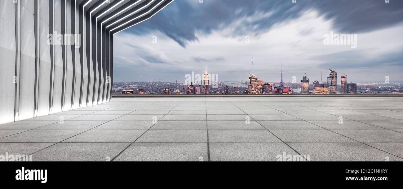 empty ground with modern cityscape new york at night Stock Photo - Alamy