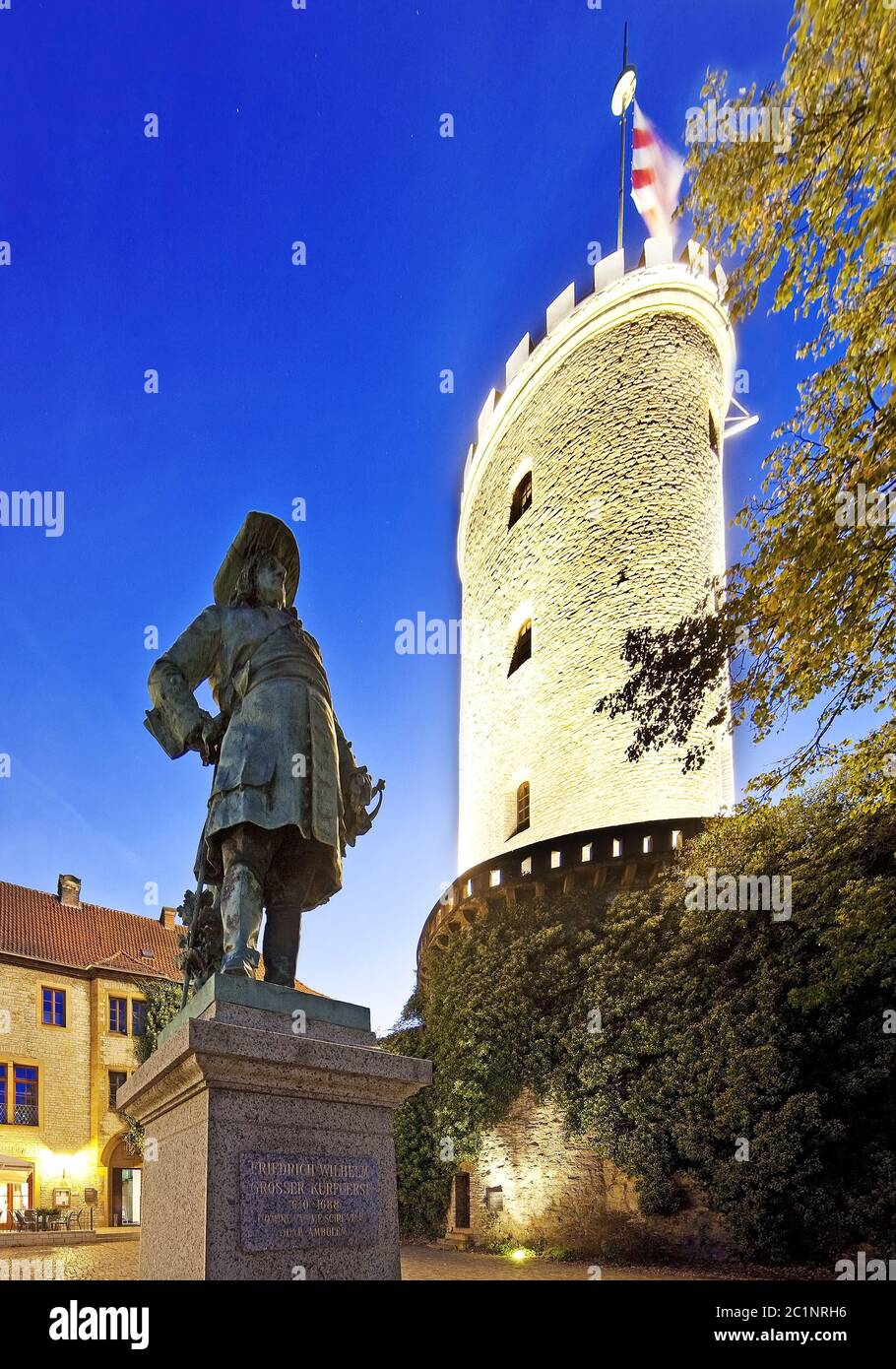 illuminated Sparrenburg Castle and statue of Friedrich Wilhelm, Bielefeld, Germany, Europe Stock Photo