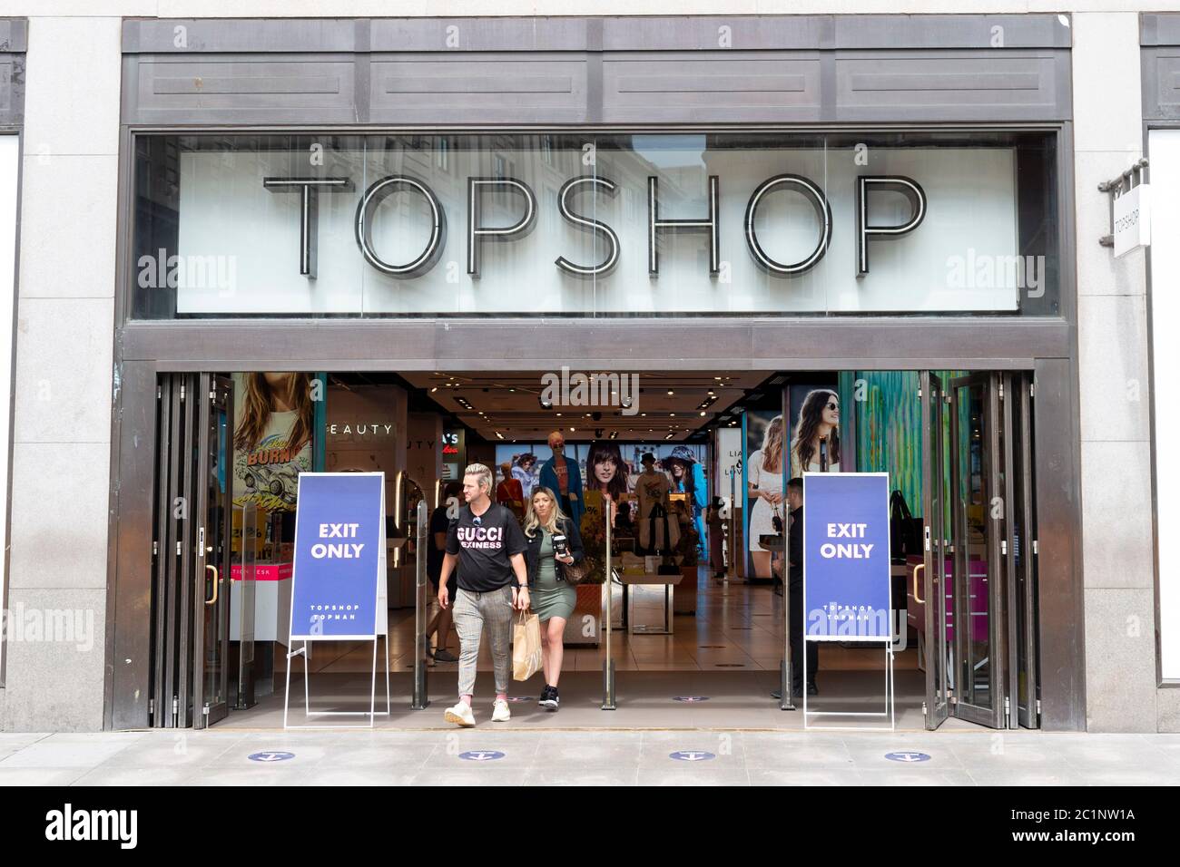 London, UK. 15th June, 2020. Customers leaving the Topshop store in Oxford  Street after the shops were allowed to reopen. Credit: SOPA Images  Limited/Alamy Live News Stock Photo - Alamy