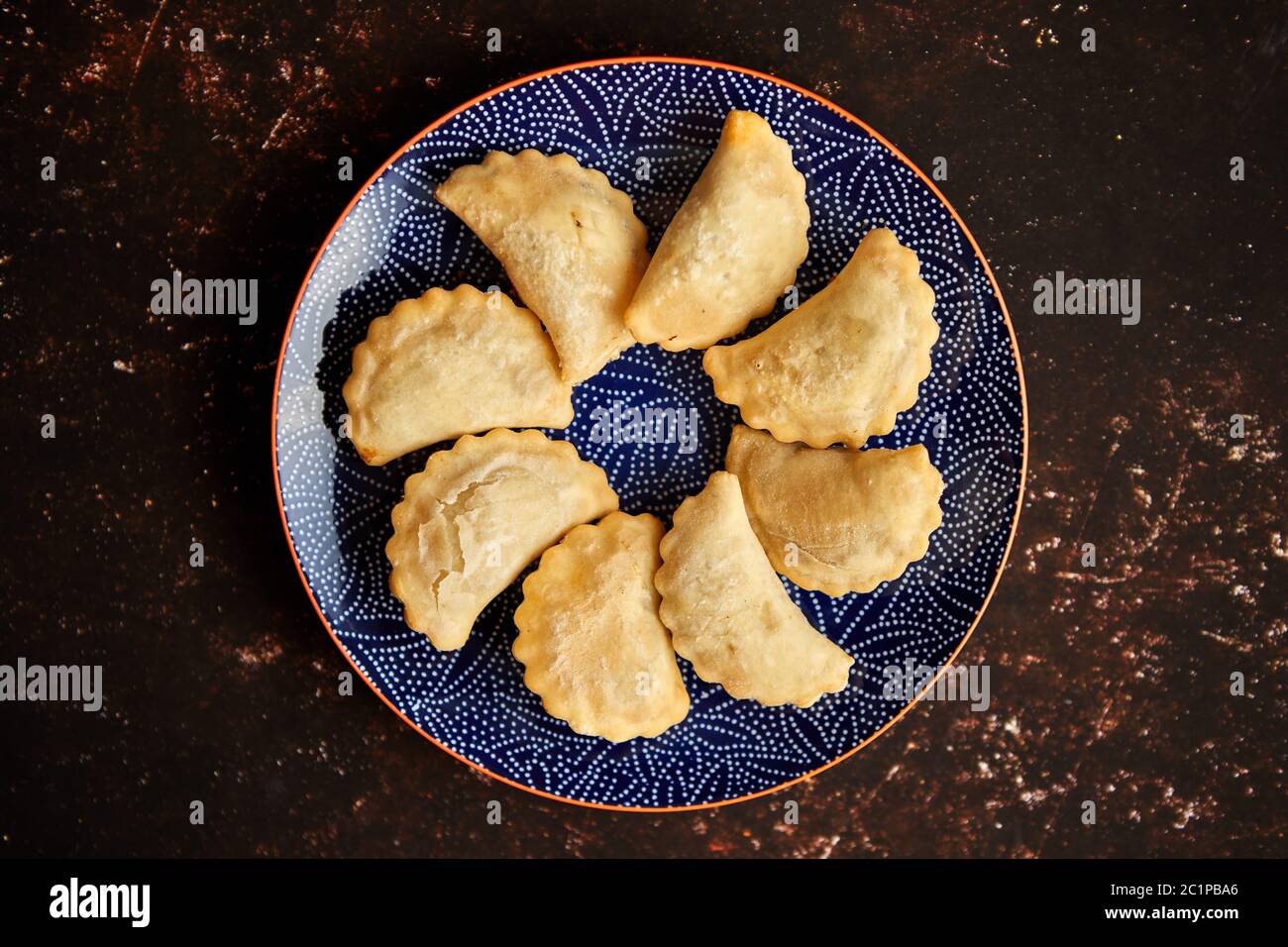 Hot and tasty deep fried polish dumplings with meat filling Stock Photo