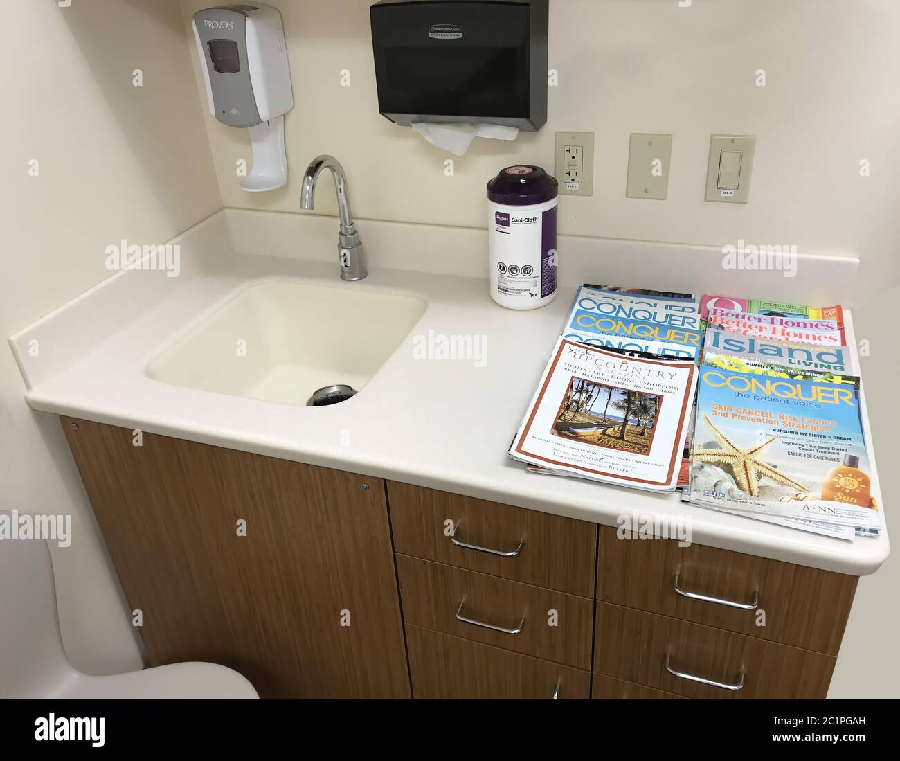 Typical clean up sink found in a medical clinic setting.  For editorial use only. Stock Photo