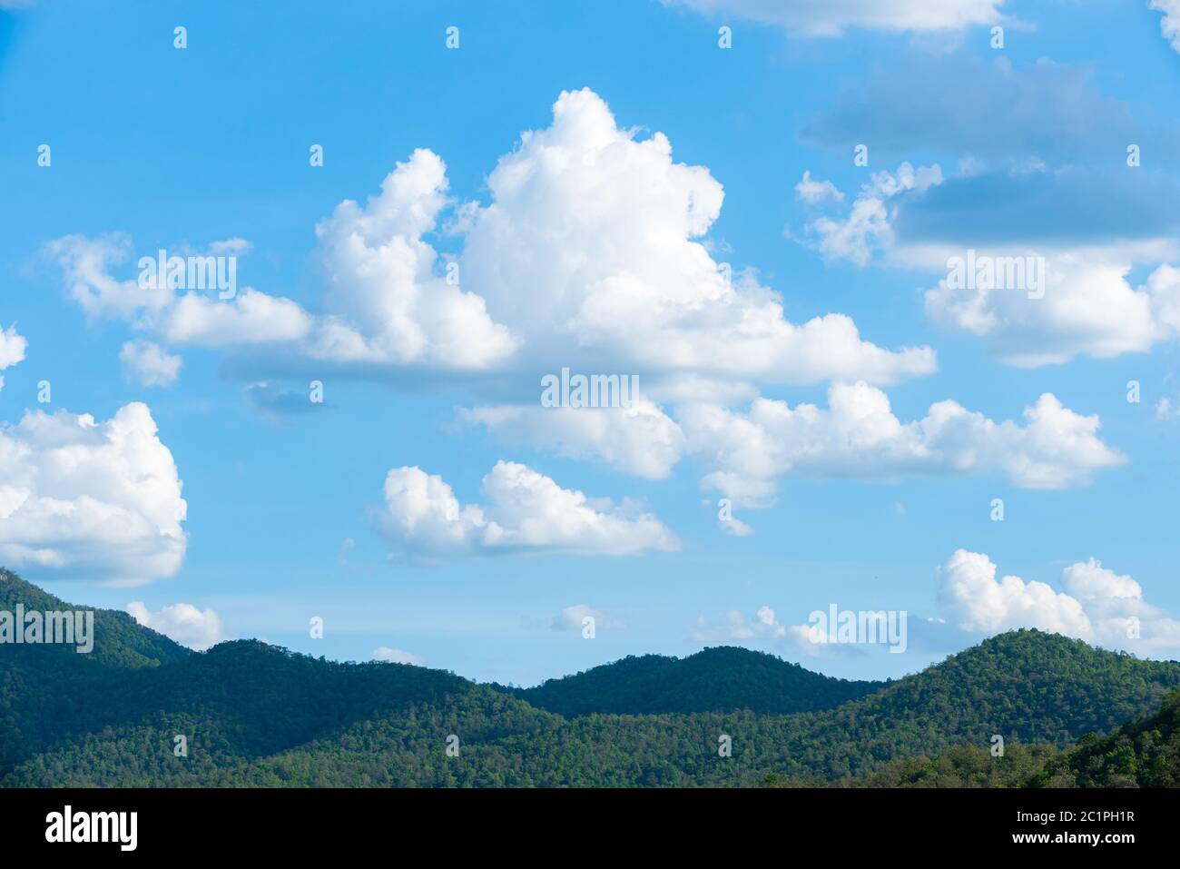 Green mountain landscape with blue sky cloudy background Stock Photo