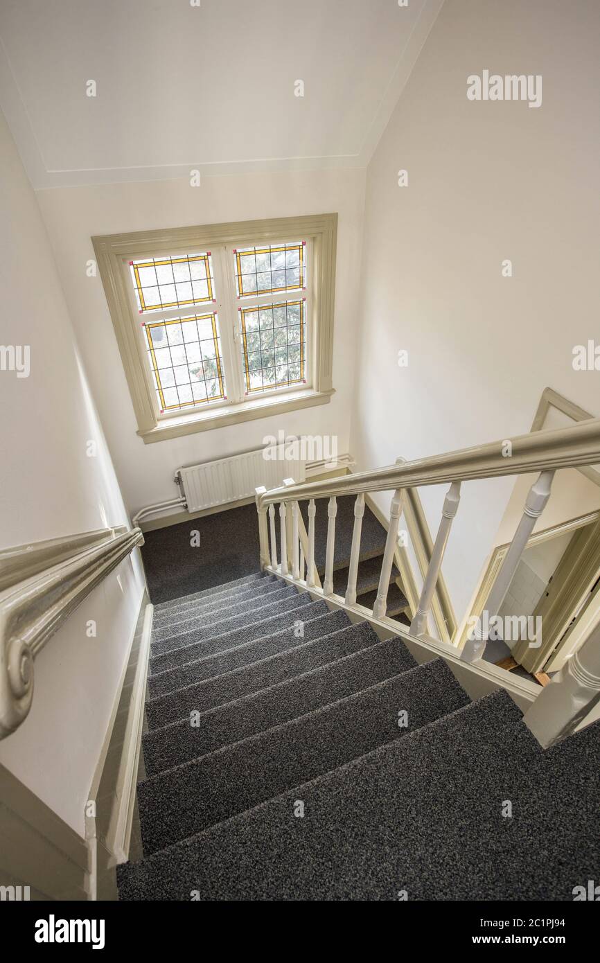 Stairs in office hallway empty and clean Stock Photo