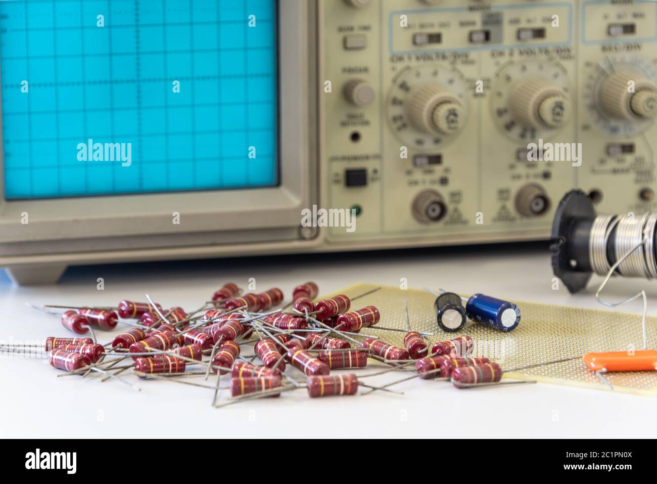 Electronic components with oscilloscope Stock Photo