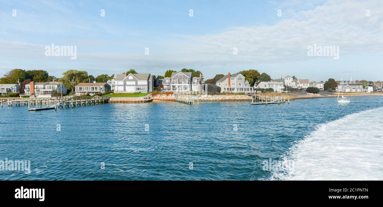 Charactistic style Cape Cod architecture along waters edge on Martha's Vineyard, Usa. Stock Photo