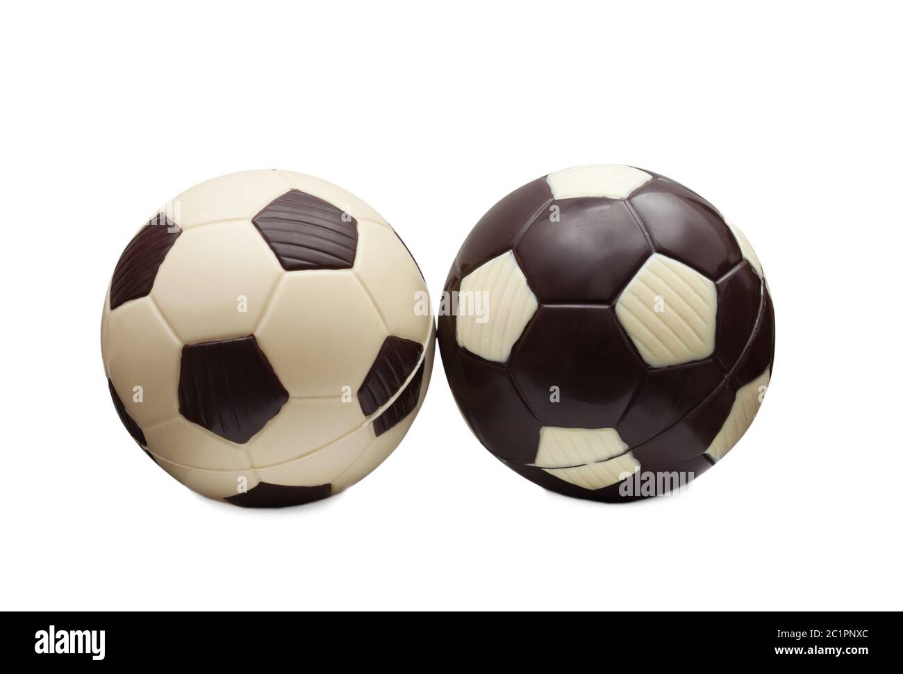Soccer balls made of white and milk chocolate Stock Photo Alamy