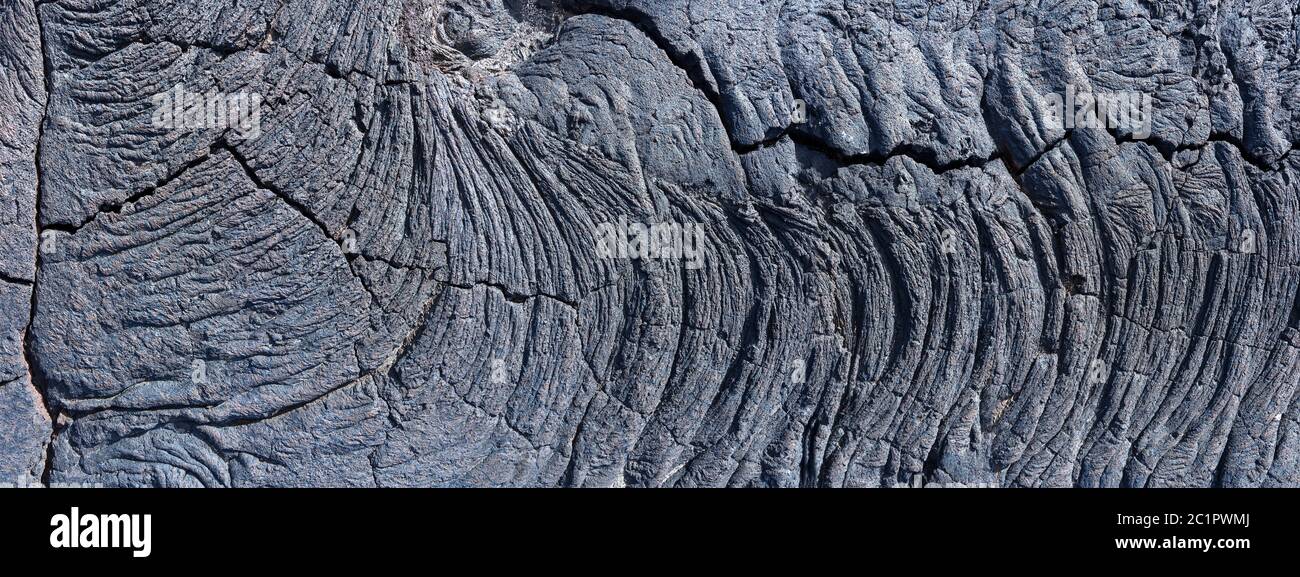 Detail of a solidified, partly broken lava as a panoramic shot, taken on the island of El Hierro, Canary Islands Stock Photo