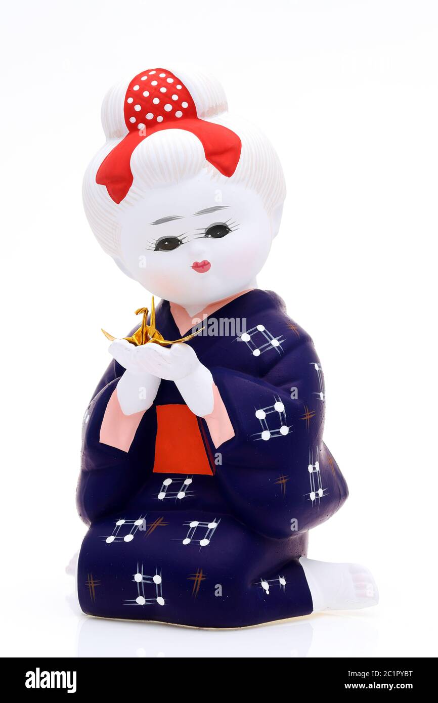 Traditional Japanese Hakata girl doll isolated on white background Stock Photo
