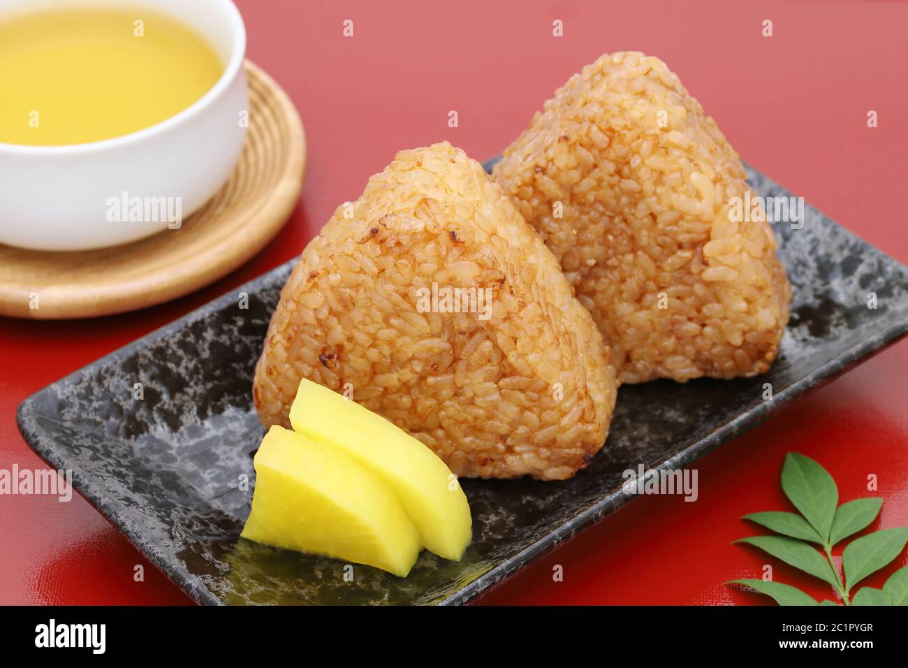 Yakionigiri, Japanese food, rice ball, rice triangle with soy sauce Stock Photo Alamy