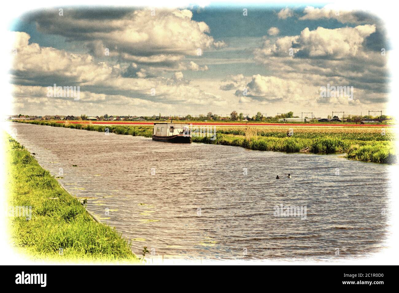 Houseboat on the Irrigation Canal Stock Photo
