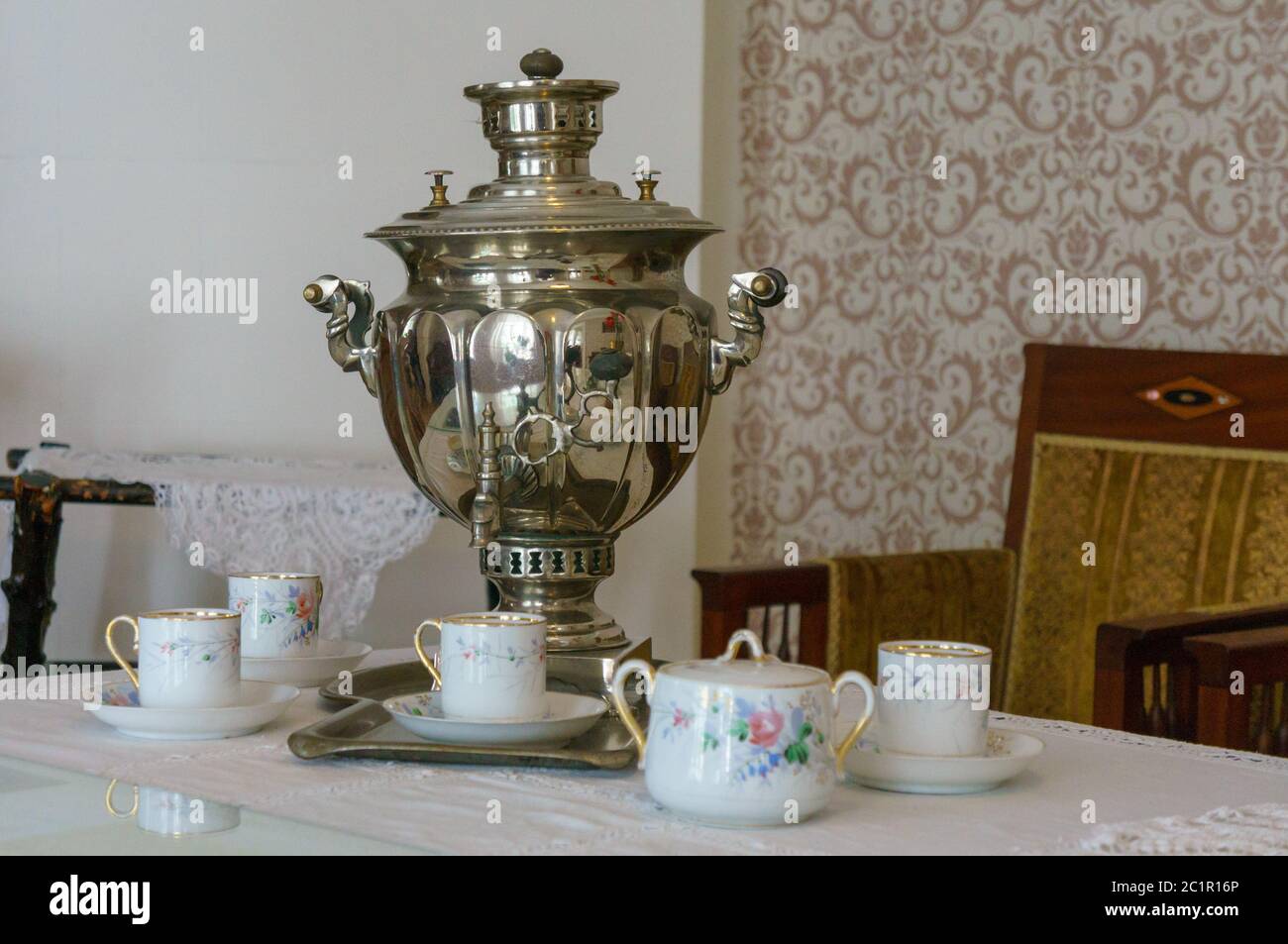 The Vintage Russian Brass Samovar With Porcelain Cups And Teapot