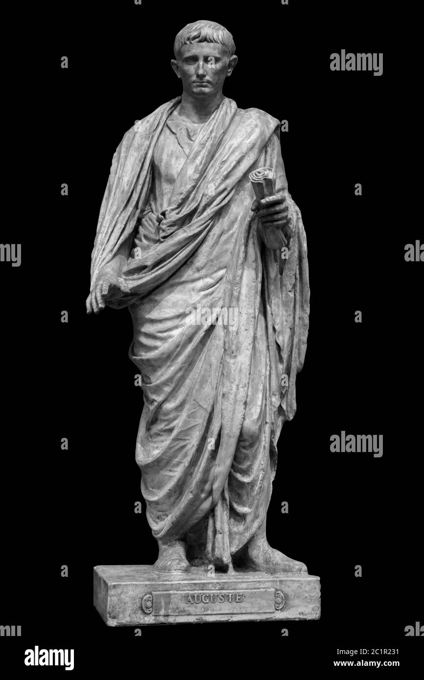 Caesar Octavianus Augustus roman emperor adopted son of Julius Caesar. Isolated statue on black Stock Photo
