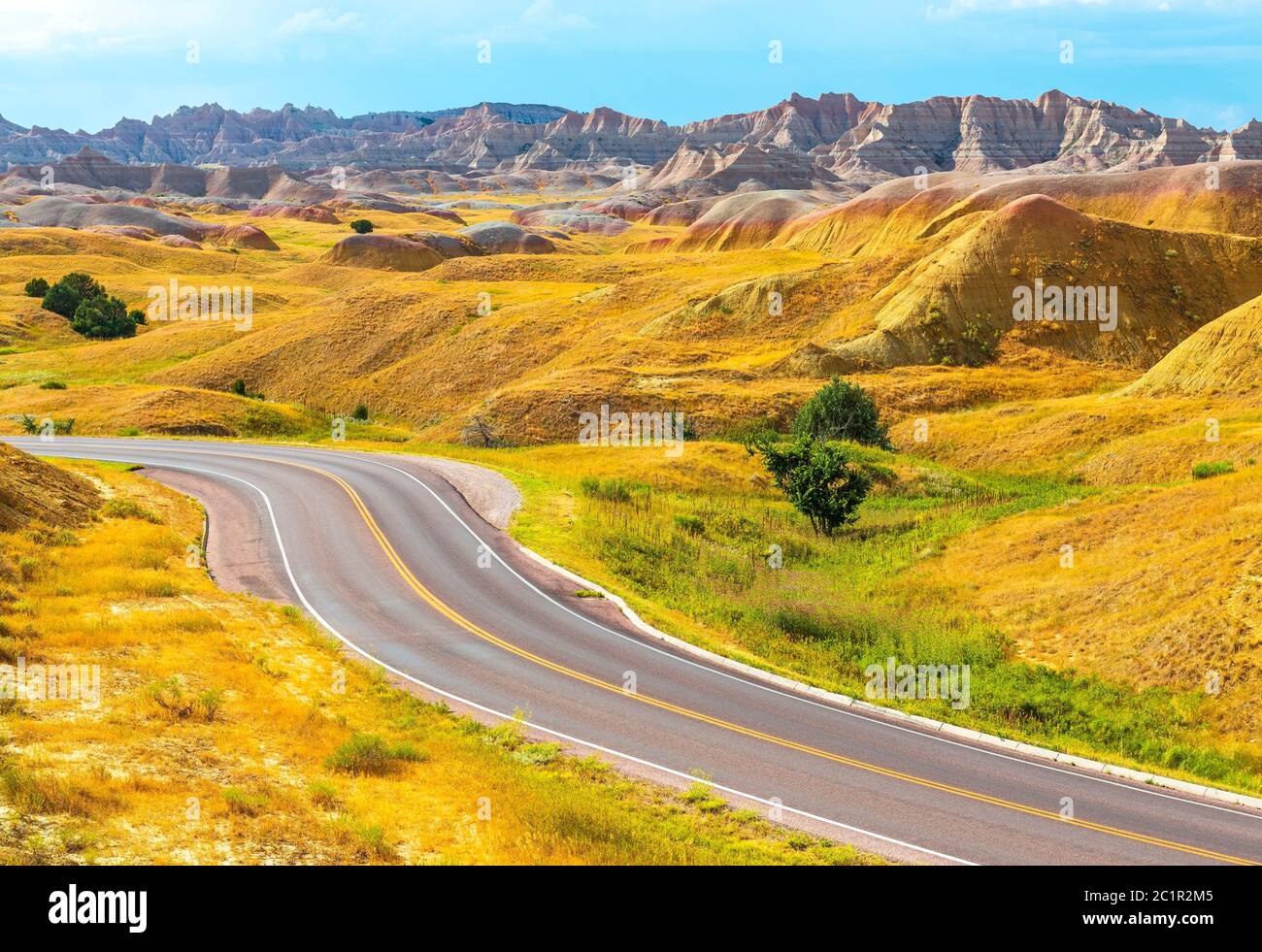 On the road by the Yellow Mounds, Badlands national park near Rapid City, South Dakota, United States of America (USA). Stock Photo