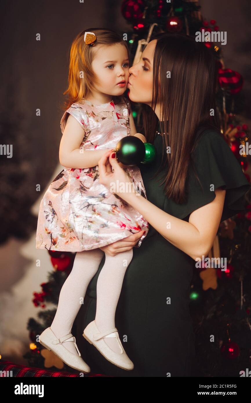 Beautiful woman in with lovely little baby girl. Stock Photo