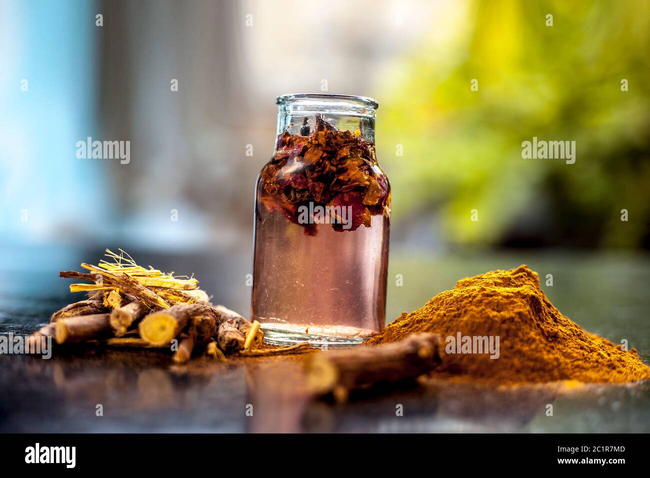 Quick Healing wound paste consisting of natural ayurvedic herbs i.e. Revand chini well mixed with rose water and honey. Shot of revand chini roots, po Stock Photo