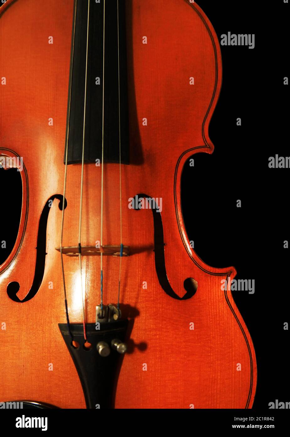 1937 old violin on the black background Stock Photo