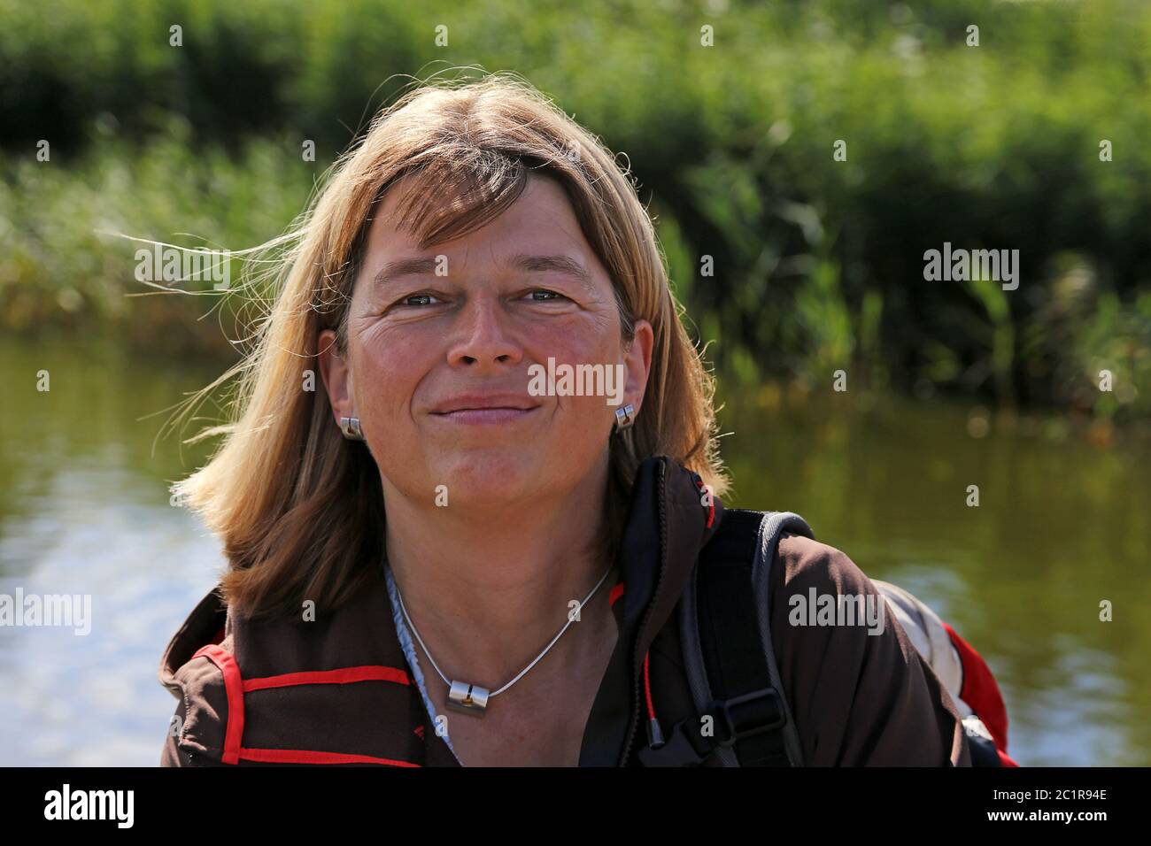 Woman around Fifty during Outdoor Activity on The Baltic Sea Stock Photo