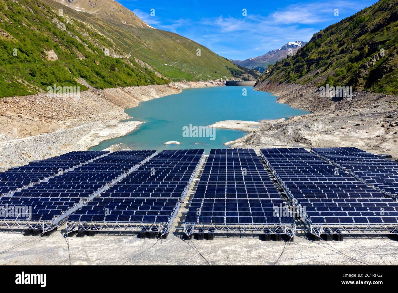 Low water levels impair the operation of the first floating alpine solar power plant, the Lac des Toules, Bourg-St-Pierre, Valais, Switzerland Stock Photo