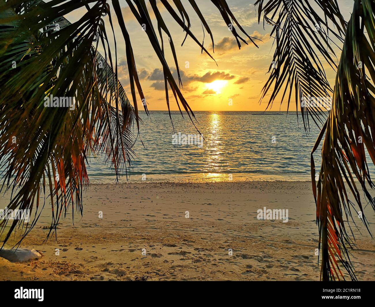 Colorful ocean beach sunset .Tropical Maldives beach Stock Photo - Alamy