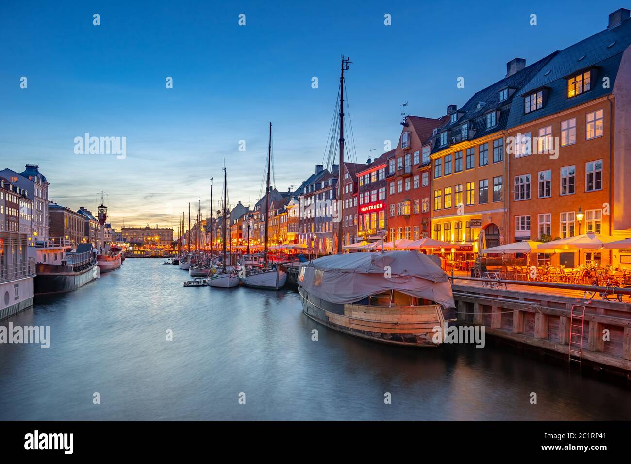 Copenhagen city at night with view of Nyhavn in Denmark Stock Photo