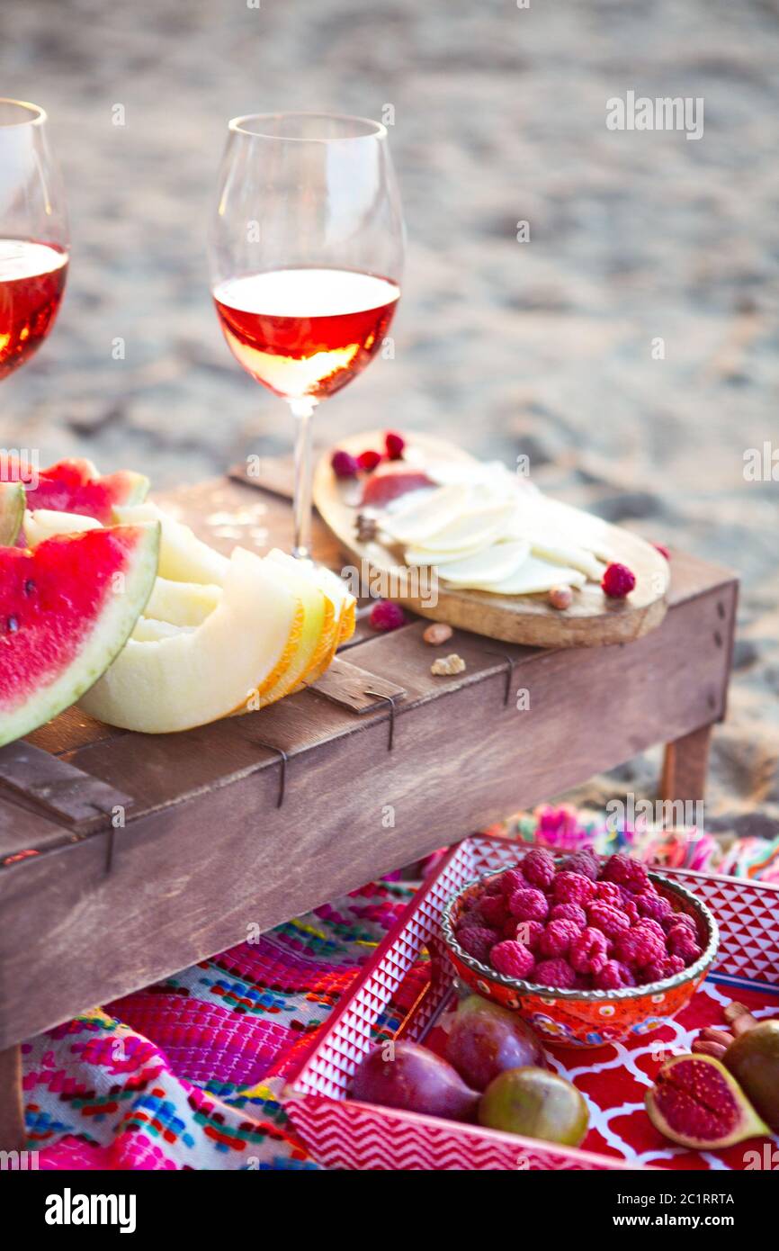 Outdoor picnic with rose wine Stock Photo Alamy