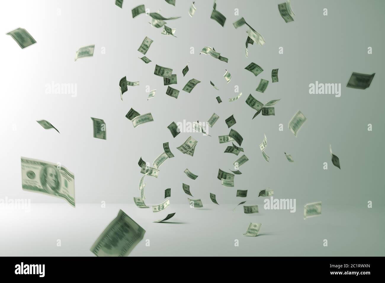 Money rain. Flying Money. Flying bills in a room Stock Photo
