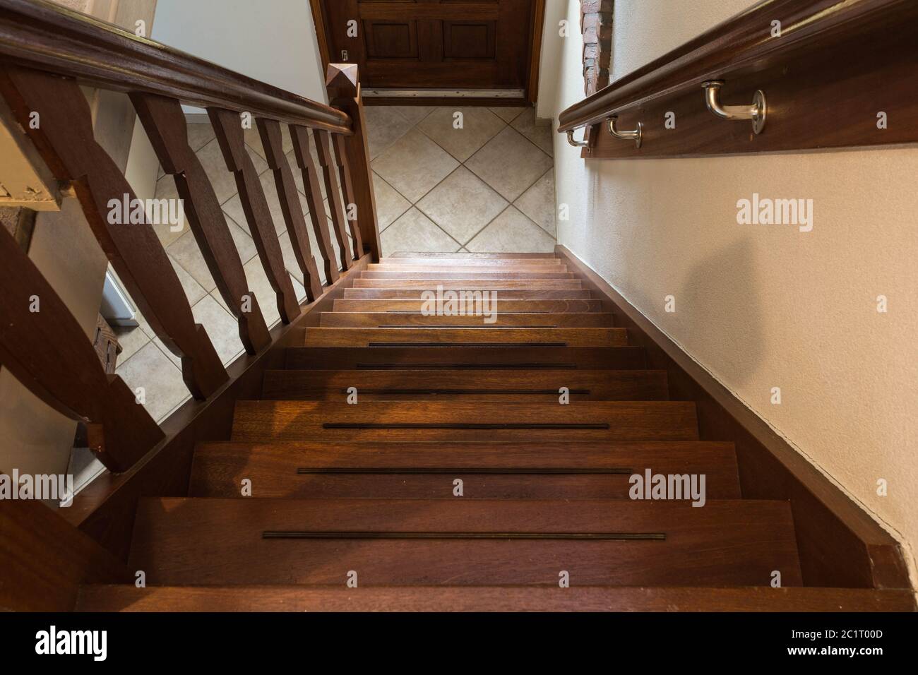 Modern brown oak wooden stairs, view from top, classic home style Stock Photo