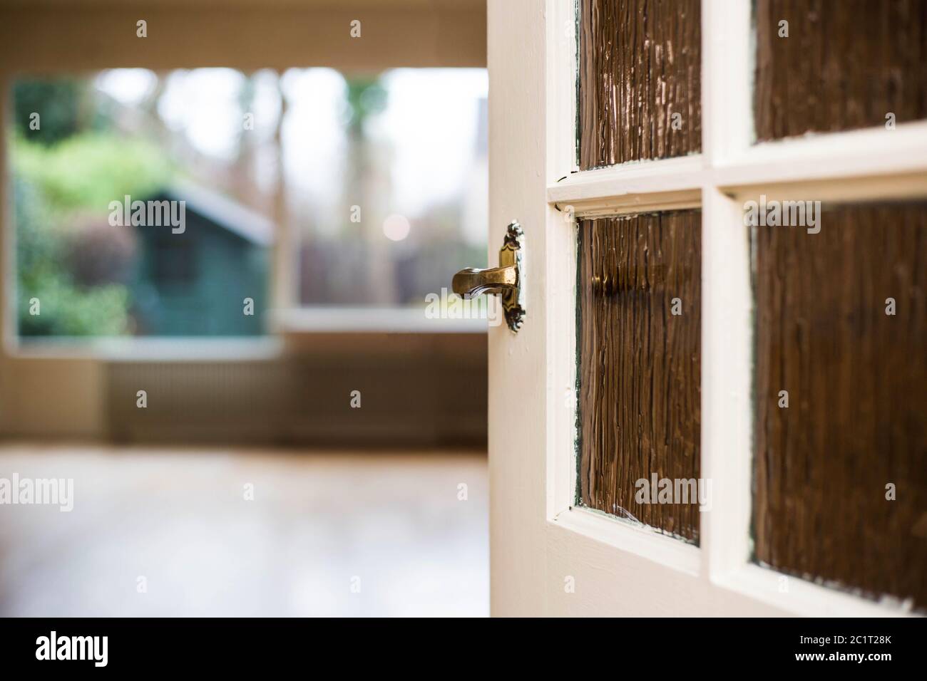 Door knob close-up to the livingroom, home concept Stock Photo
