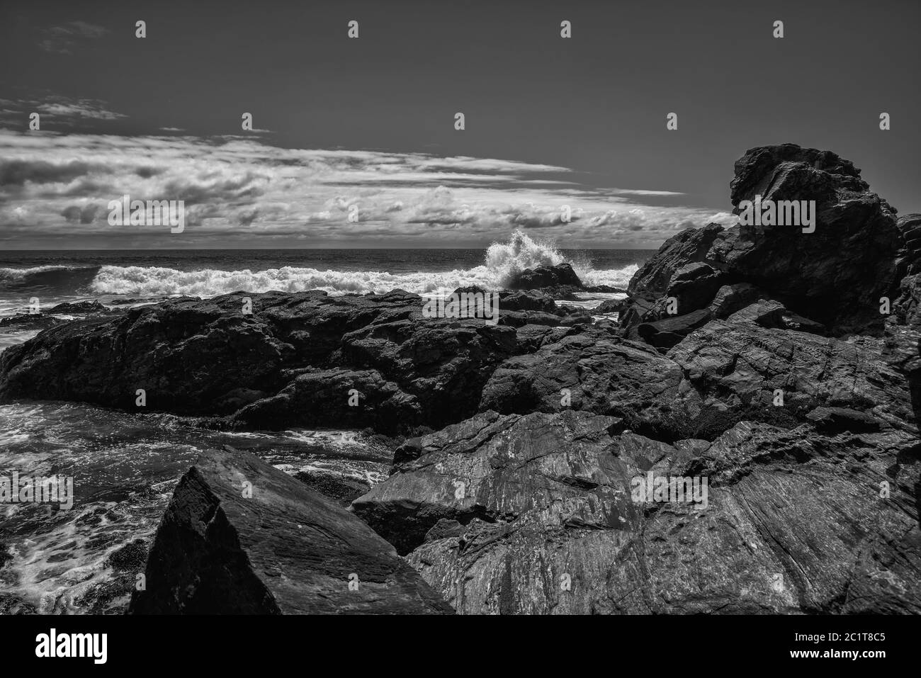 Ocean waves flow over rocky hi-res stock photography and images - Alamy