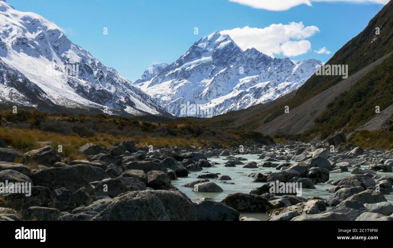 a shot of mt cook, with clouds, and the hooker river Stock Photo - Alamy