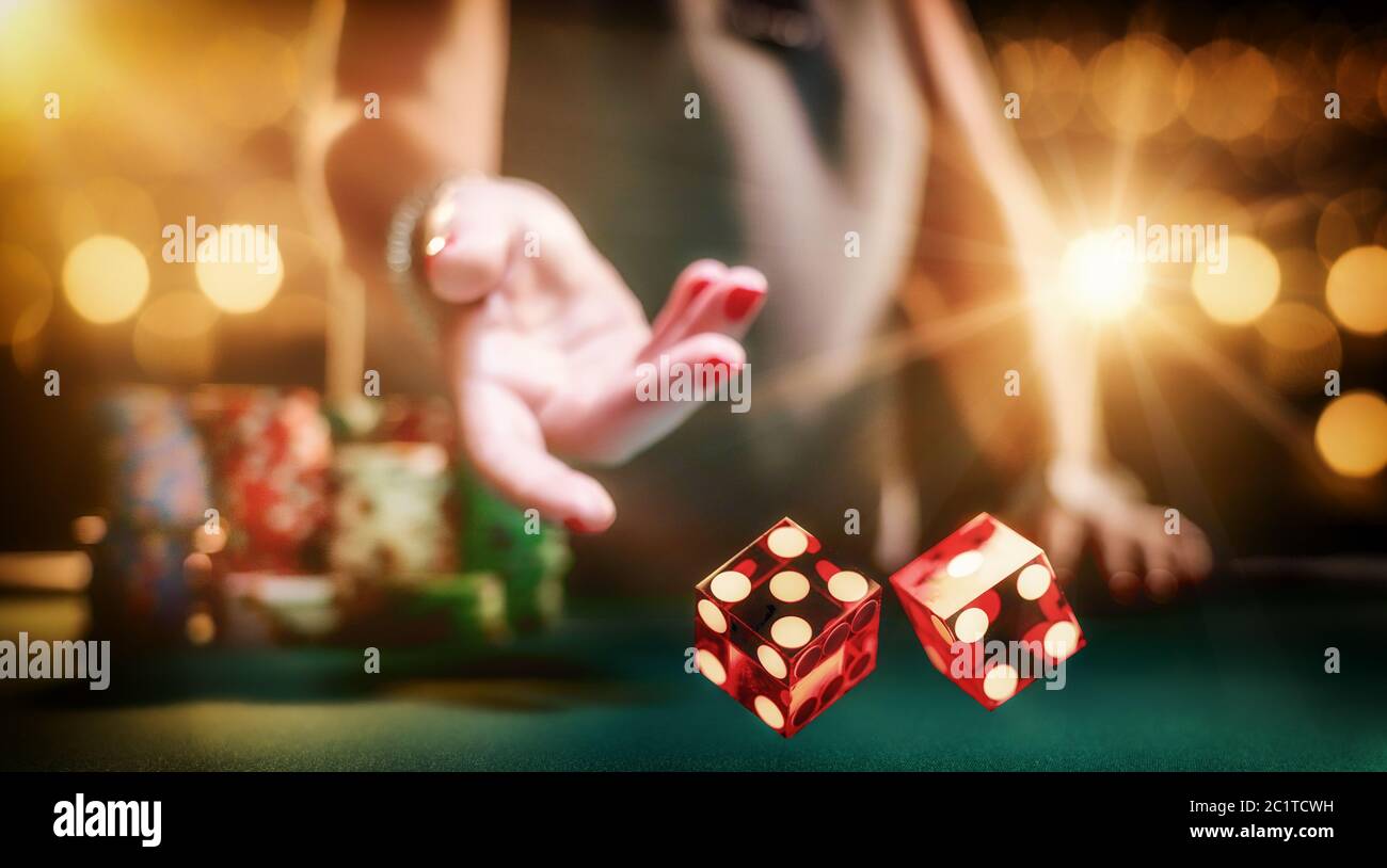 Female throwing dice hires stock photography and images Alamy
