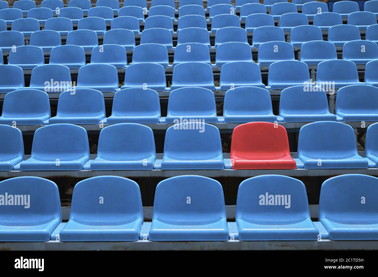 Empty seats in a stadium with one special Stock Photo - Alamy