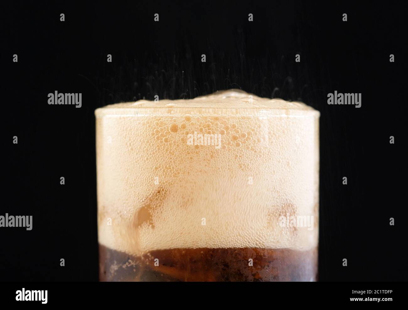 ice cube in fizzy splashing water with soda bubble Stock Photo - Alamy