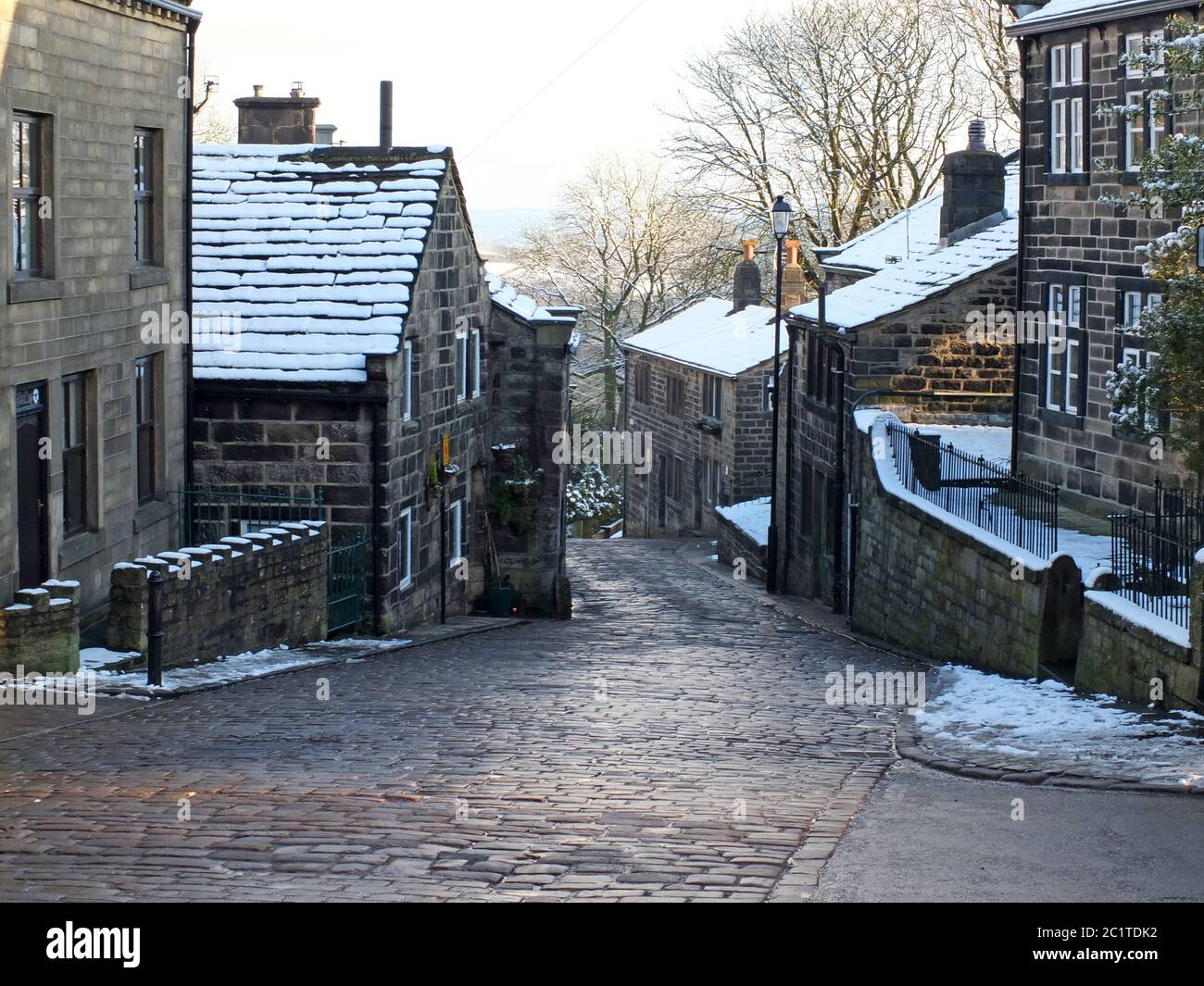 the historic yorkshire village of heptonstall in winter with snow ...